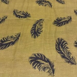 Yellow feather motif scarf